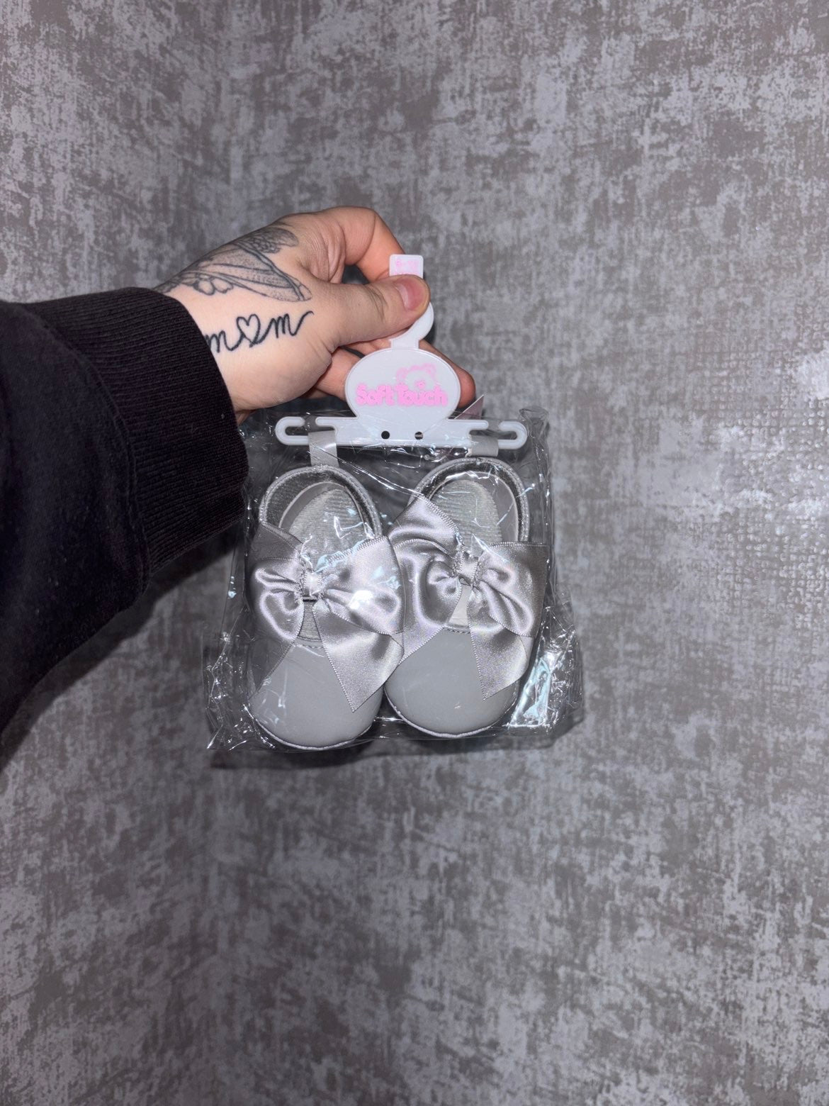 Grey bow shoes